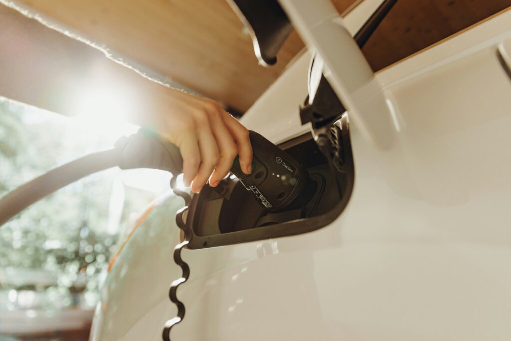 Plugging in a Level 2 EV charger at home in Austin